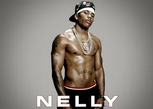 Nelly Shirtless With A Fierce Expression With Name Wallpaper