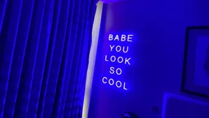 Neon Blue Room With Led Signage Wallpaper