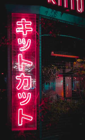 Neon Lights Of Japan - A Showcase Of The Country's Vibrant Night Life Wallpaper
