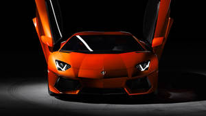 Neon Orange Lamborghini Wallpaper