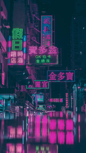 Neon Signs In A City At Night Wallpaper