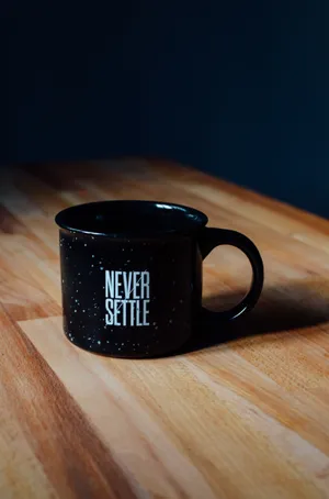 Never Settle Inspirational Quote Wallpaper