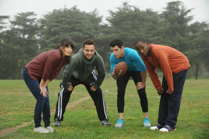 New Girl Cast On Football Field Wallpaper