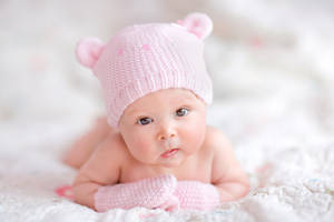 Newborn Baby Pink Hand Gloves Wallpaper