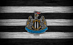 Newcastle United Fc Logo On Wood Wallpaper