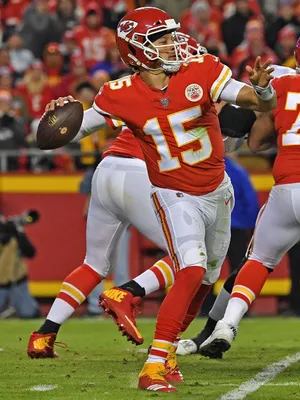 Nfl All-star Pat Mahomes On The Phone Wallpaper