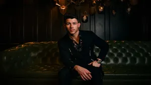 Nick Jonas On Elegant Couch Wallpaper