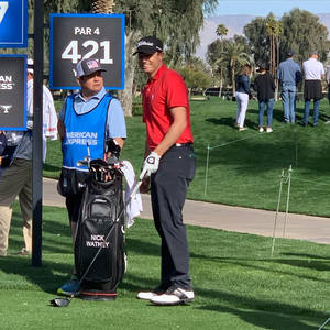 Nick Watney Swinging With Precision On The Golf Course Wallpaper