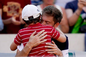 Nicolas Mahut And Son Hug Wallpaper