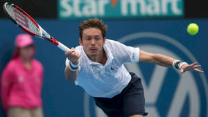 Nicolas Mahut Running After The Ball Wallpaper