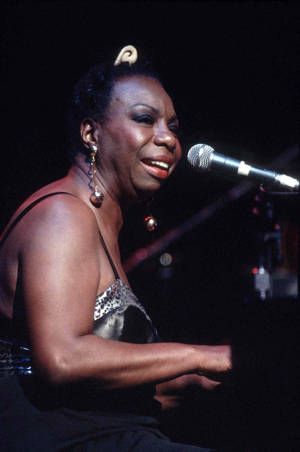 Nina Simone American Singer Playing Piano Wallpaper