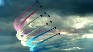 Nine Planes Soar Through A Smoky Sky Wallpaper