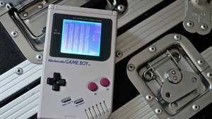 Nintendo Game Boy On Steel Floor Wallpaper