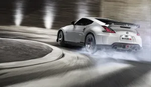 Nissan 370z With Smoking Wheels Wallpaper