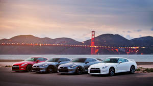 Nissan Gtr Cars Parked Near The Sea Wallpaper