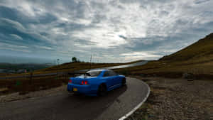 Nissan Skyline Gtr Car In Countryside Wallpaper
