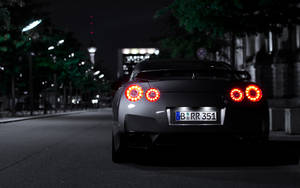 Nissan Skyline Gtr R33 Red Lights Wallpaper