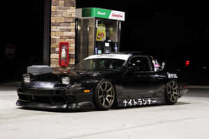Nissan240sx Modifiedat Gas Station Night Wallpaper