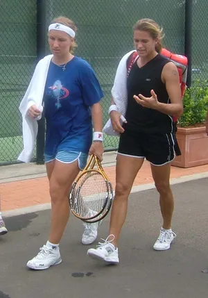 Notable Professional Tennis Players, Svetlana Kuznetsova And Amelie Mauresmo In A Match. Wallpaper