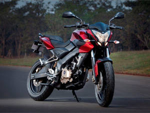 Ns 200 Black And Red On Road Wallpaper