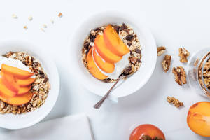 Oatmeal With Peaches, Yogurt, And Walnuts Wallpaper