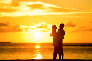 Ocean Sunset Couple Wallpaper