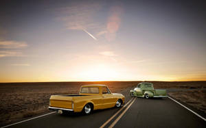 Old Ford Trucks During Sunset Wallpaper