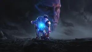 Oled 4k Iron Man And Thanos Wallpaper