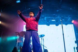 Oliver Tree Waving His Hands Wallpaper