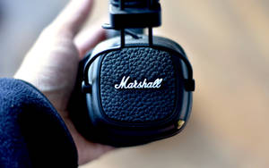 On Hand Marshall Headphone Wallpaper