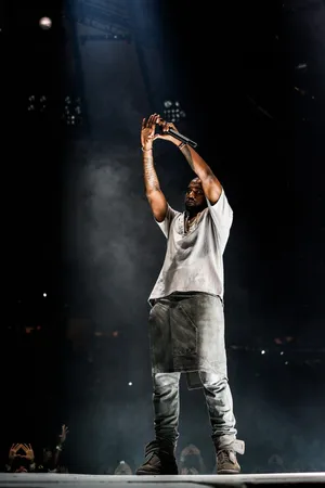 On-stage Hands Up Kanye West Android Wallpaper