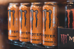 Orange And Black Monster Energy Cans Wallpaper