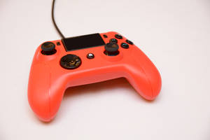 Orange Corded Joystick Wallpaper