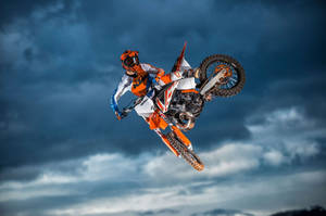 Orange Dirt Bike Midair Wallpaper