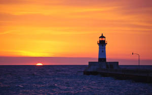 Orange Ocean Sky Lighthouse Wallpaper