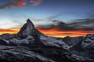 Orange Sunset Sky Behind The Matterhorn Wallpaper
