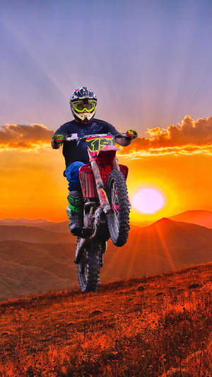 Orange Sunset With Dirt Bike Wallpaper