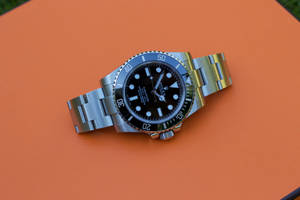 Orange Surface Rolex Wallpaper