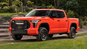 Orange Tundra Pickup Truck Wallpaper