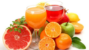 Oranges Grapefruits And Apple Drinks Wallpaper