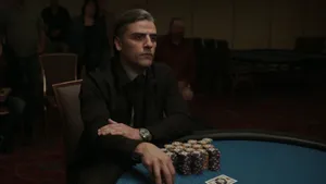 Oscar Isaac Playing Casino Wallpaper