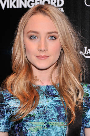 Oscar-nominated Actress Saoirse Ronan With Wavy Blonde Locks Wallpaper