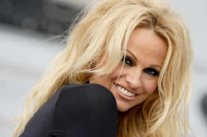 Pamela Anderson In Glamorous Photo Shoot Wallpaper