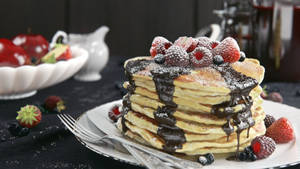 Pancakes Topped With Sweets Wallpaper