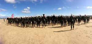 Panoramic Shot Of Triathlon Athletes Wallpaper