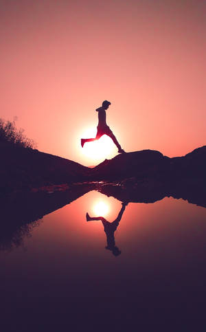 Parkour Man At Sunset Wallpaper