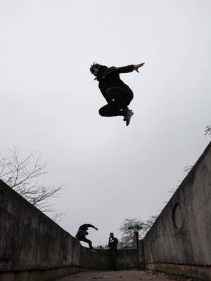 Parkour Man In Midair Wallpaper