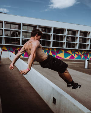 Parkour Man On White Wall Wallpaper