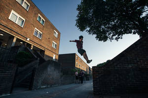 Parkour On Brick Wall Wallpaper