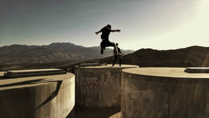 Parkour On Concrete Water Tanks Wallpaper